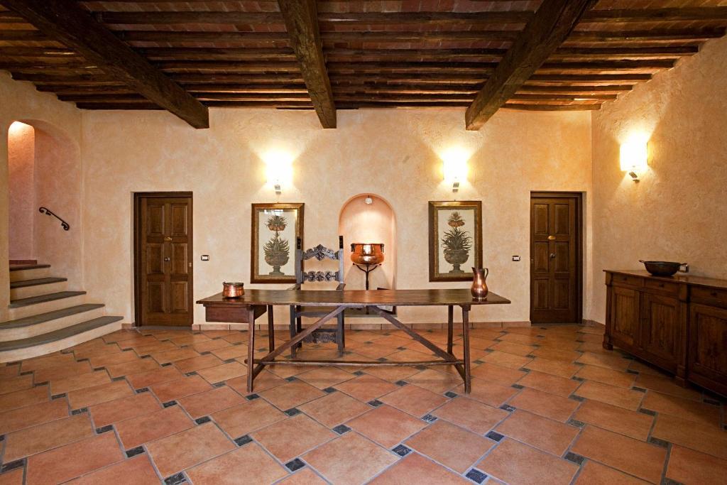 Апарт отель Residenza Palazzo Saloni Монтальчино Экстерьер фото