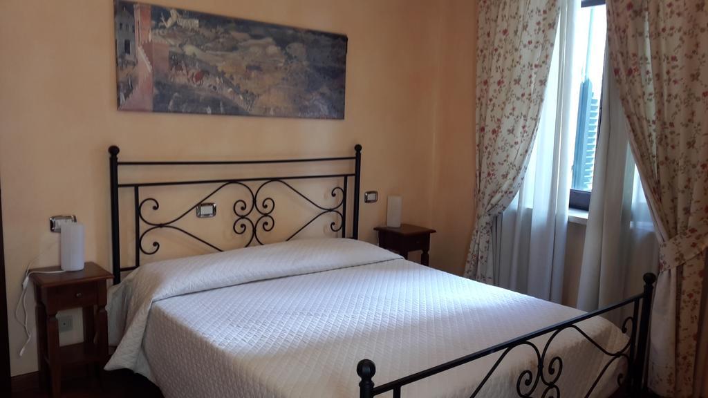 Апарт отель Residenza Palazzo Saloni Монтальчино Экстерьер фото