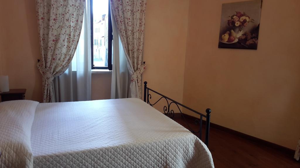 Апарт отель Residenza Palazzo Saloni Монтальчино Экстерьер фото