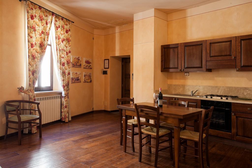 Апарт отель Residenza Palazzo Saloni Монтальчино Экстерьер фото