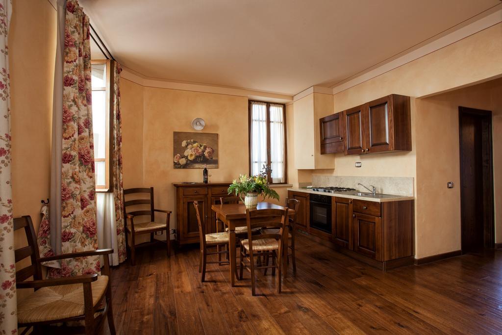Апарт отель Residenza Palazzo Saloni Монтальчино Экстерьер фото
