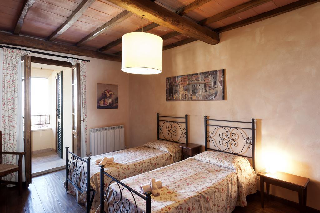 Апарт отель Residenza Palazzo Saloni Монтальчино Экстерьер фото