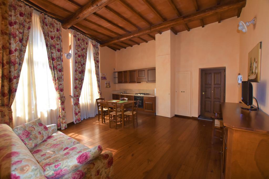 Апарт отель Residenza Palazzo Saloni Монтальчино Экстерьер фото
