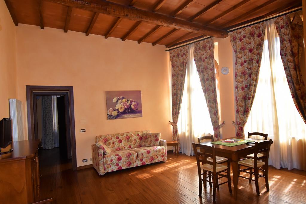 Апарт отель Residenza Palazzo Saloni Монтальчино Экстерьер фото