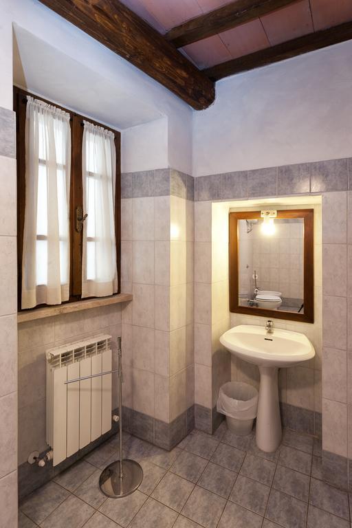 Апарт отель Residenza Palazzo Saloni Монтальчино Экстерьер фото