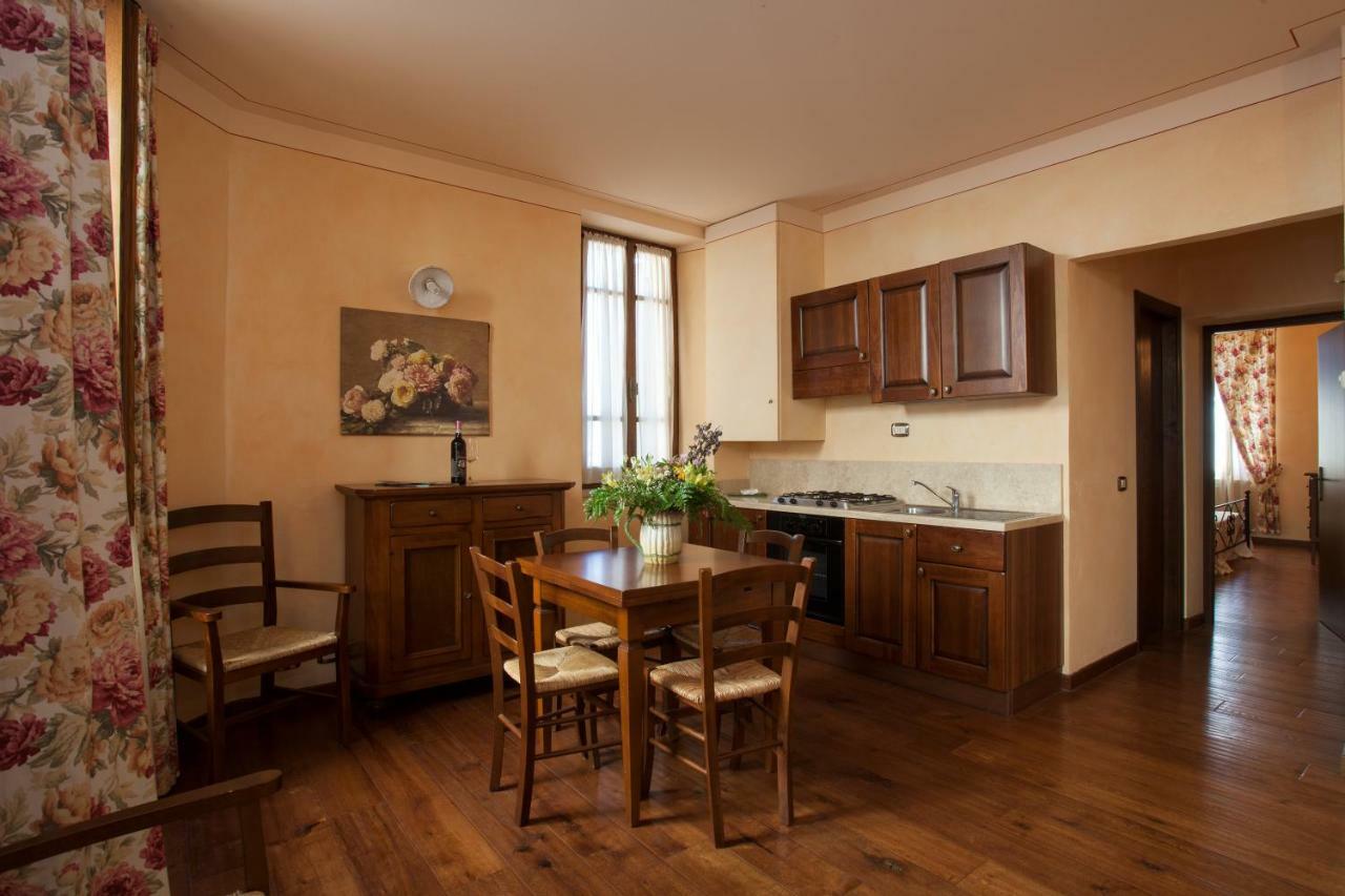 Апарт отель Residenza Palazzo Saloni Монтальчино Экстерьер фото
