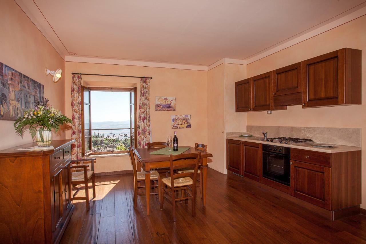 Апарт отель Residenza Palazzo Saloni Монтальчино Экстерьер фото